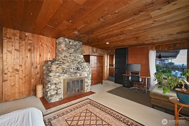 8204 Naketa Beach Walk, Mukilteo, WA 98275 - living room with wood ceiling, wood walls, a fireplace, and an office area