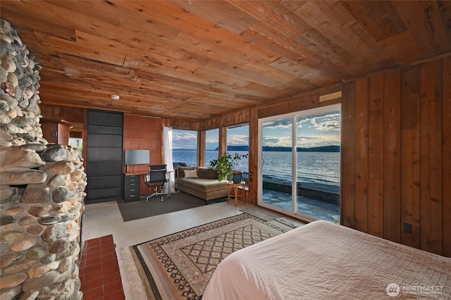 8204 Naketa Beach Walk, Mukilteo, WA 98275 - bedroom featuring wood ceiling, access to outside, wooden walls, and a water view