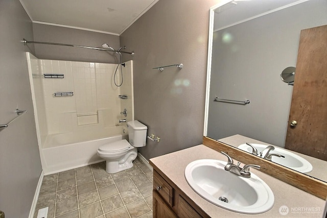 831 SW 364th Pl, Federal Way, WA 98023 - bathroom with crown molding, toilet, vanity, bathing tub / shower combination, and baseboards