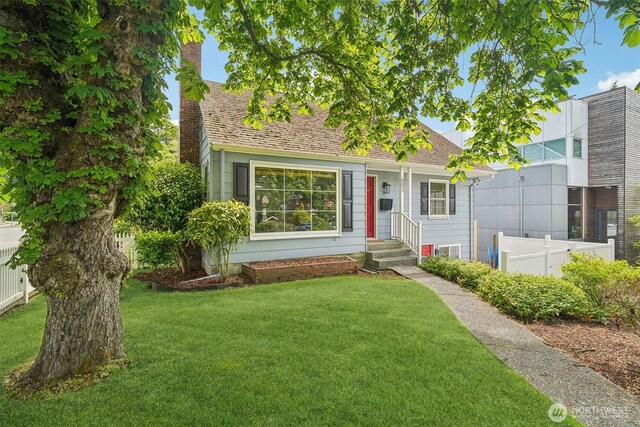 603 NW 52nd St, Seattle, WA 98107 - view of front of home with a shingled roof and a chimney