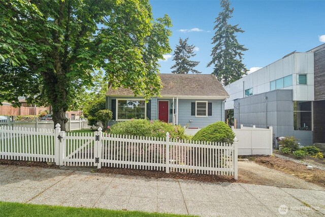 603 NW 52nd St, Seattle, WA 98107 - view of front of property with a fenced front yard and a gate