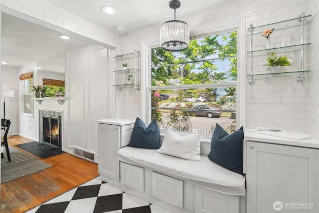 603 NW 52nd St, Seattle, WA 98107 - sitting room with a fireplace with flush hearth, recessed lighting, and a chandelier