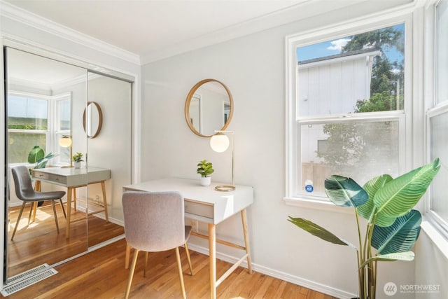 603 NW 52nd St, Seattle, WA 98107 - office area with wood finished floors, crown molding, and baseboards