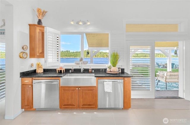 62 E N Bay Rd, Allyn, WA 98524 - kitchen featuring dishwasher, a sink, and brown cabinets