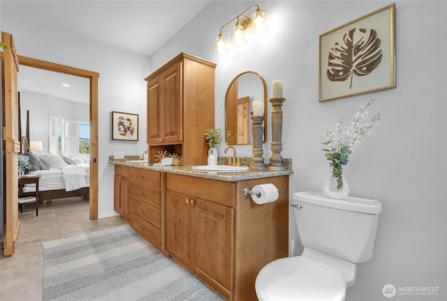 62 E N Bay Rd, Allyn, WA 98524 - full bath featuring double vanity, toilet, and connected bathroom