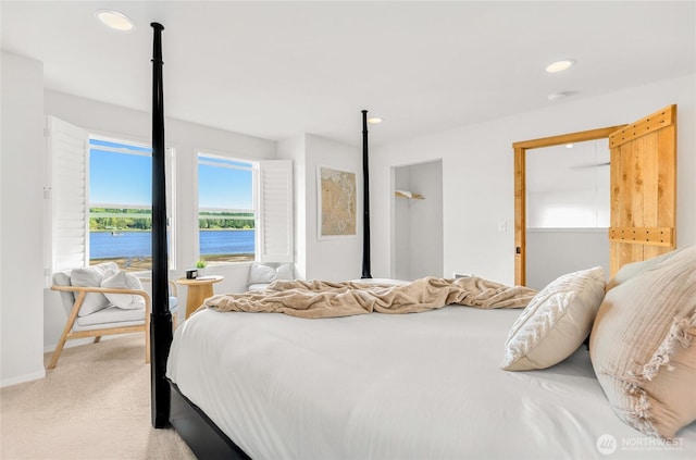 62 E N Bay Rd, Allyn, WA 98524 - bedroom with light colored carpet, recessed lighting, and baseboards