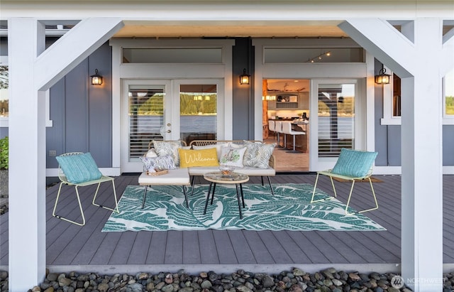 62 E N Bay Rd, Allyn, WA 98524 - wooden terrace featuring french doors and an outdoor living space