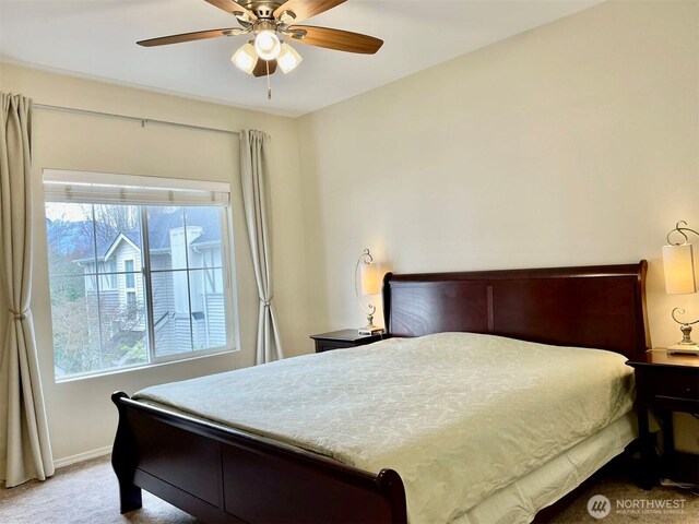 4459 249th Ter SE Unit 8-5, Issaquah, WA 98029 - bedroom with carpet floors, baseboards, and ceiling fan