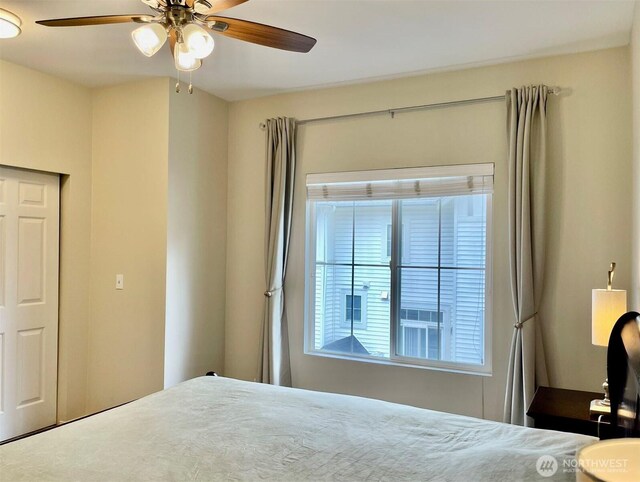4459 249th Ter SE Unit 8-5, Issaquah, WA 98029 - bedroom featuring a ceiling fan