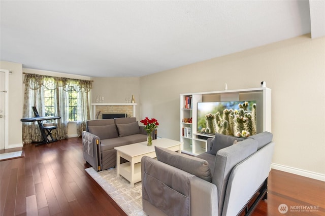 8407 18th Ave W Unit 6-104, Everett, WA 98204 - living room with wood finished floors, baseboards, and a fireplace
