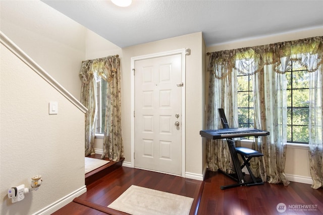 8407 18th Ave W Unit 6-104, Everett, WA 98204 - entryway with wood finished floors and baseboards