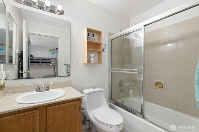 8407 18th Ave W Unit 6-104, Everett, WA 98204 - bathroom with vanity, bath / shower combo with glass door, and toilet