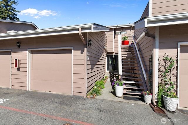 8407 18th Ave W Unit 6-104, Everett, WA 98204 - doorway to property featuring a garage