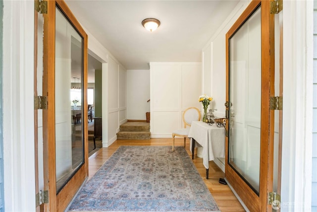 8082 Daniel Pl NW, Silverdale, WA 98383 - hallway with light wood-style floors and stairs