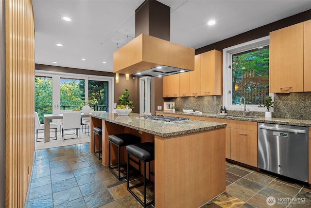 530 Alexander Ave, Kirkland, WA 98033 - kitchen featuring stainless steel appliances, island exhaust hood, a sink, stone tile floors, and recessed lighting