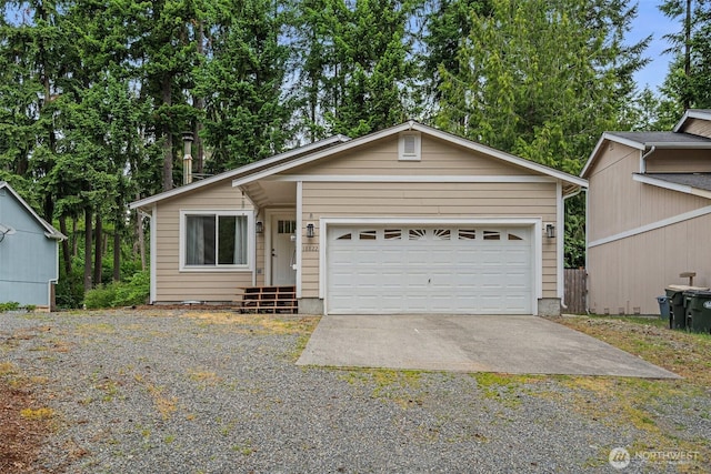 18822 Rampart Dr SE, Yelm, WA 98597 - view of front facade featuring an attached garage and gravel driveway