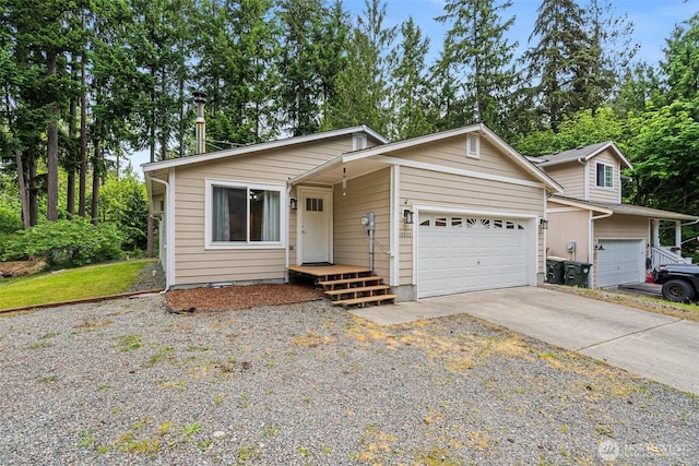 18822 Rampart Dr SE, Yelm, WA 98597 - view of front of home with driveway and a garage