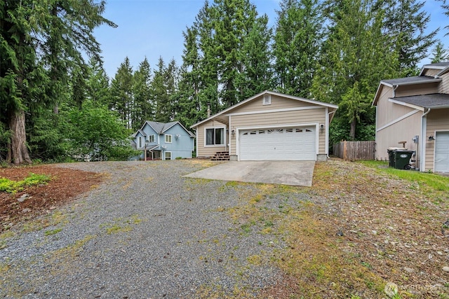 18822 Rampart Dr SE, Yelm, WA 98597 - view of front of house with a detached garage