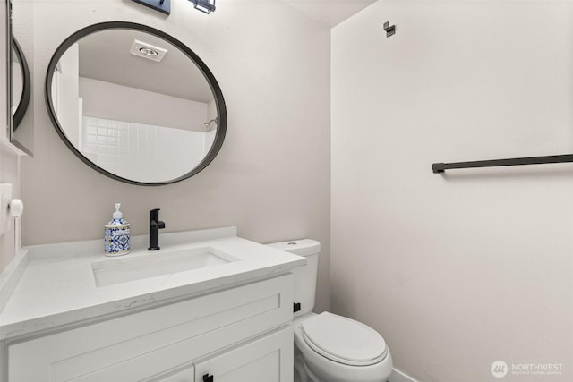 18822 Rampart Dr SE, Yelm, WA 98597 - bathroom with vanity, toilet, and baseboards
