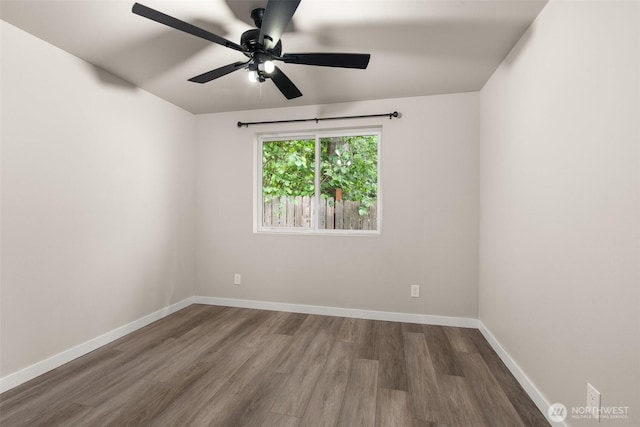 18822 Rampart Dr SE, Yelm, WA 98597 - empty room with wood finished floors, a ceiling fan, and baseboards