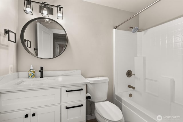 18822 Rampart Dr SE, Yelm, WA 98597 - bathroom featuring toilet, vanity, and bathing tub / shower combination