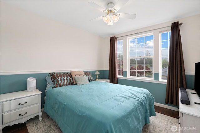 23813 109th Street Ct E, Buckley, WA 98321 - bedroom with wood finished floors, baseboards, and a ceiling fan