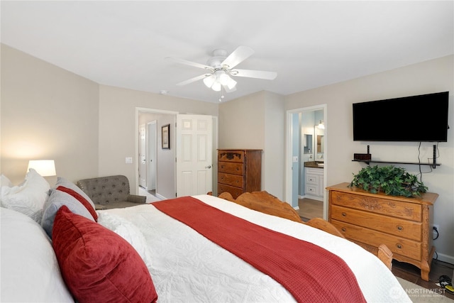 23813 109th Street Ct E, Buckley, WA 98321 - bedroom featuring ceiling fan, connected bathroom, and baseboards