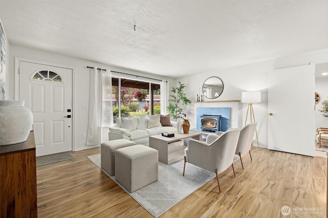 19019 Grannis Rd, Bothell, WA 98012 - living room featuring wood finished floors and a textured ceiling