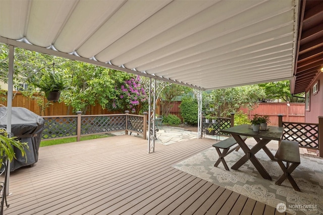 19019 Grannis Rd, Bothell, WA 98012 - wooden terrace featuring a fenced backyard, outdoor dining area, and area for grilling