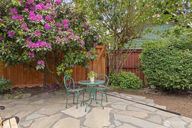 19019 Grannis Rd, Bothell, WA 98012 - fenced backyard featuring a patio