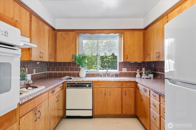 1420 Olympic Ave, Edmonds, WA 98020 - kitchen featuring white appliances, a sink, tasteful backsplash, and light countertops