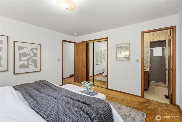 1420 Olympic Ave, Edmonds, WA 98020 - bedroom featuring light carpet, a closet, and connected bathroom