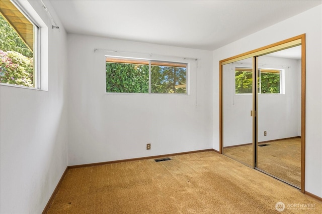 1420 Olympic Ave, Edmonds, WA 98020 - unfurnished bedroom with carpet floors, a closet, and baseboards
