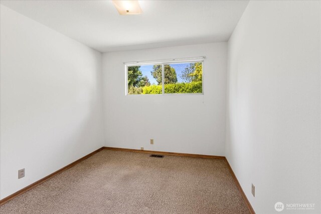 1420 Olympic Ave, Edmonds, WA 98020 - spare room featuring carpet and baseboards