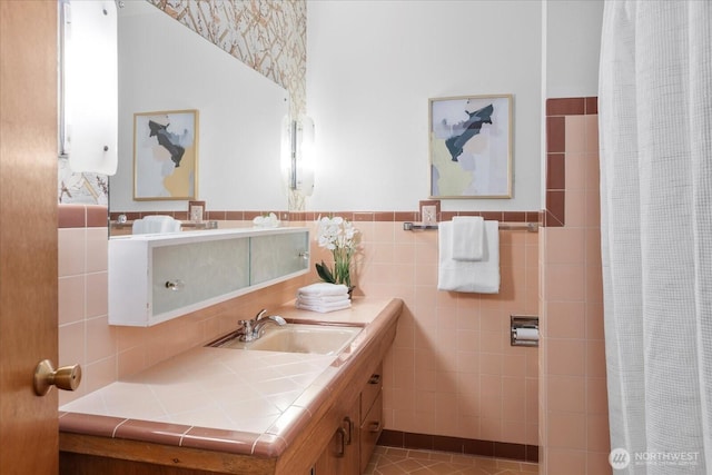 1420 Olympic Ave, Edmonds, WA 98020 - bathroom featuring vanity, tile walls, a shower with curtain, and a wainscoted wall