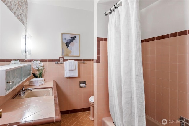 1420 Olympic Ave, Edmonds, WA 98020 - full bath featuring tile walls, shower / tub combo with curtain, a wainscoted wall, toilet, and vanity