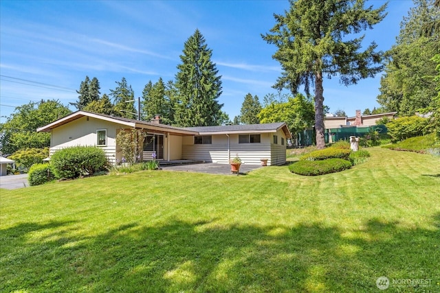 1420 Olympic Ave, Edmonds, WA 98020 - view of front of home featuring a front lawn and a chimney