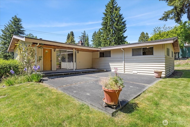 1420 Olympic Ave, Edmonds, WA 98020 - single story home featuring a patio area and a front lawn