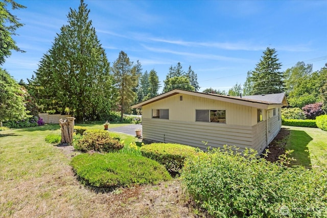 1420 Olympic Ave, Edmonds, WA 98020 - view of home's exterior with a lawn
