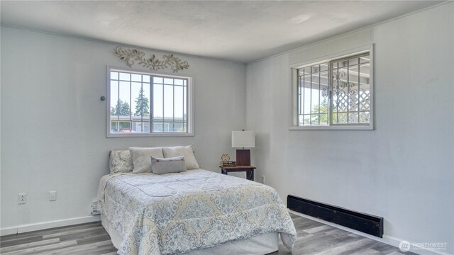 4821 101st St SW, Lakewood, WA 98499 - bedroom featuring wood finished floors and baseboards