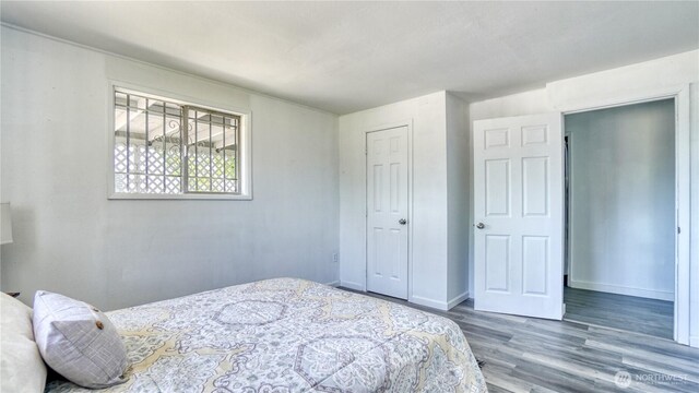 4821 101st St SW, Lakewood, WA 98499 - bedroom with wood finished floors and baseboards