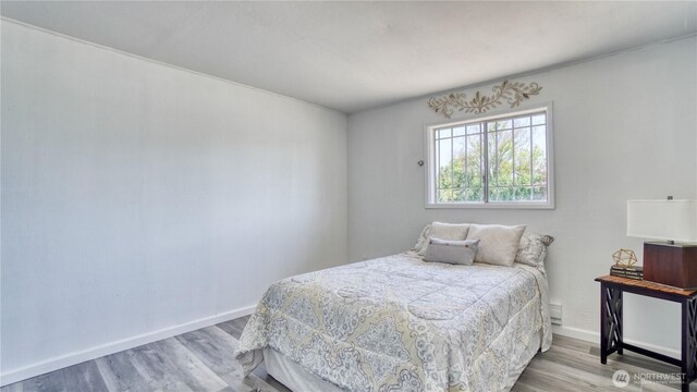4821 101st St SW, Lakewood, WA 98499 - bedroom featuring wood finished floors and baseboards
