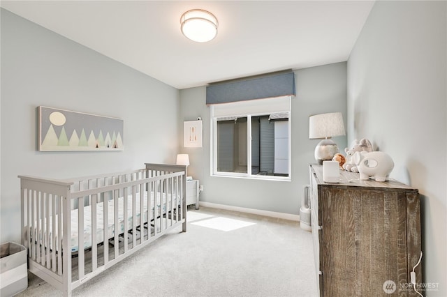 2349 N 147th St Unit B, Shoreline, WA 98133 - carpeted bedroom featuring a nursery area and baseboards