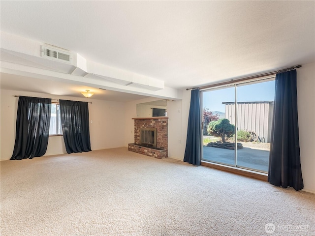 604 N Larch Ave, East Wenatchee, WA 98802 - unfurnished living room with carpet flooring and a fireplace