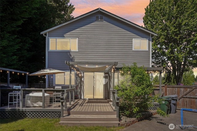 8712 177th St E, Puyallup, WA 98375 - rear view of house with a wooden deck