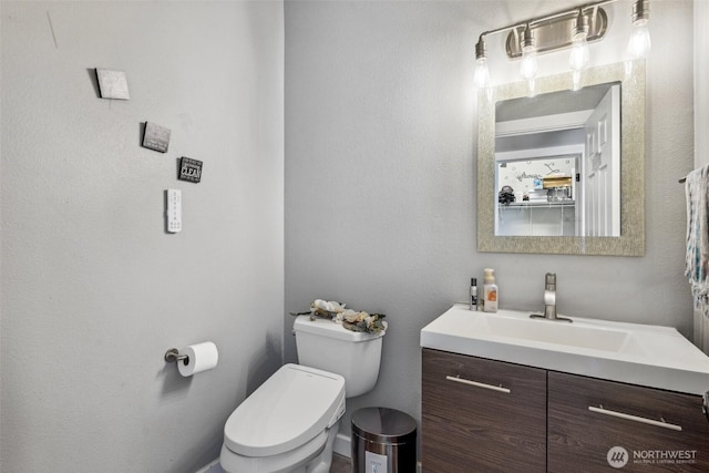8712 177th St E, Puyallup, WA 98375 - bathroom featuring vanity and toilet