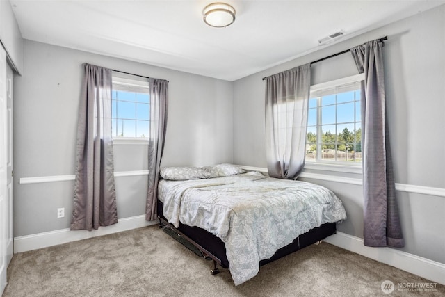 8712 177th St E, Puyallup, WA 98375 - carpeted bedroom with baseboards