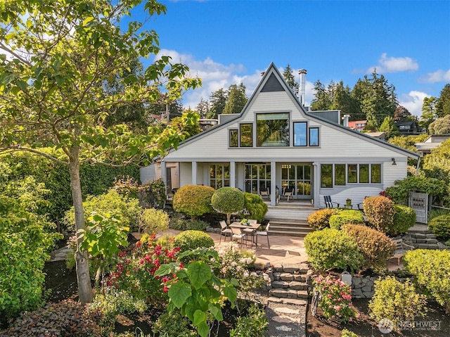 1237 Hawley Way NE, Bainbridge Island, WA 98110 - back of house featuring covered porch