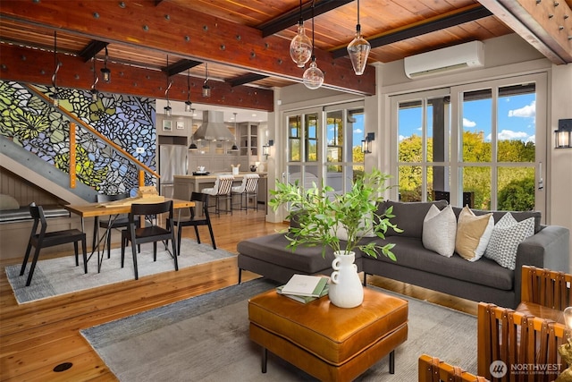 1237 Hawley Way NE, Bainbridge Island, WA 98110 - living room featuring a wall mounted AC, hardwood / wood-style flooring, and a wooden ceiling with exposed beams