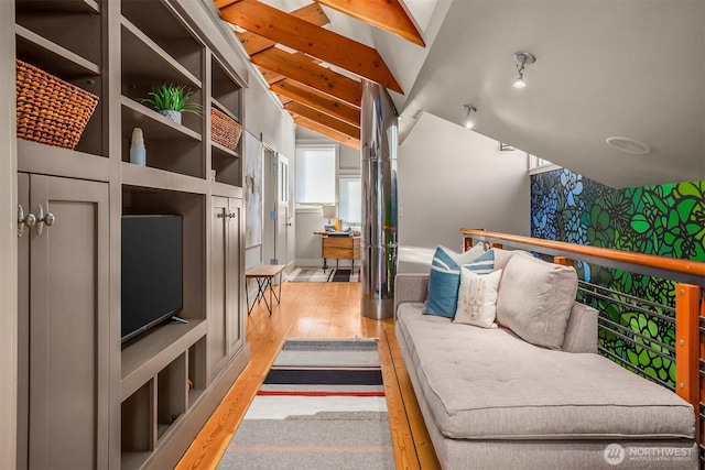 1237 Hawley Way NE, Bainbridge Island, WA 98110 - living area featuring wood finished floors and vaulted ceiling